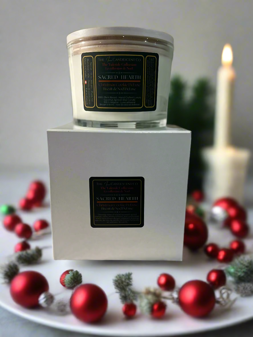 Candle in a white container with a label on a textured surface