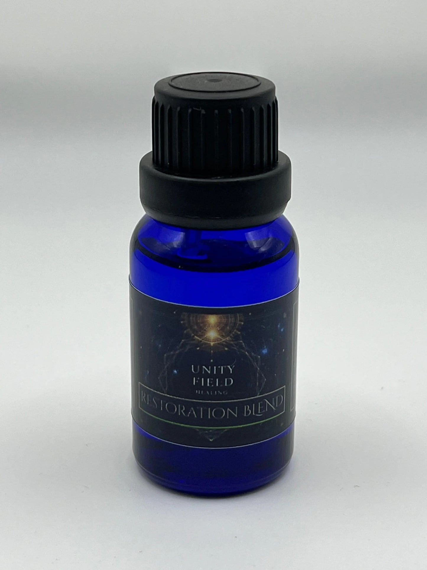 Blue bottle with black cap on a white background