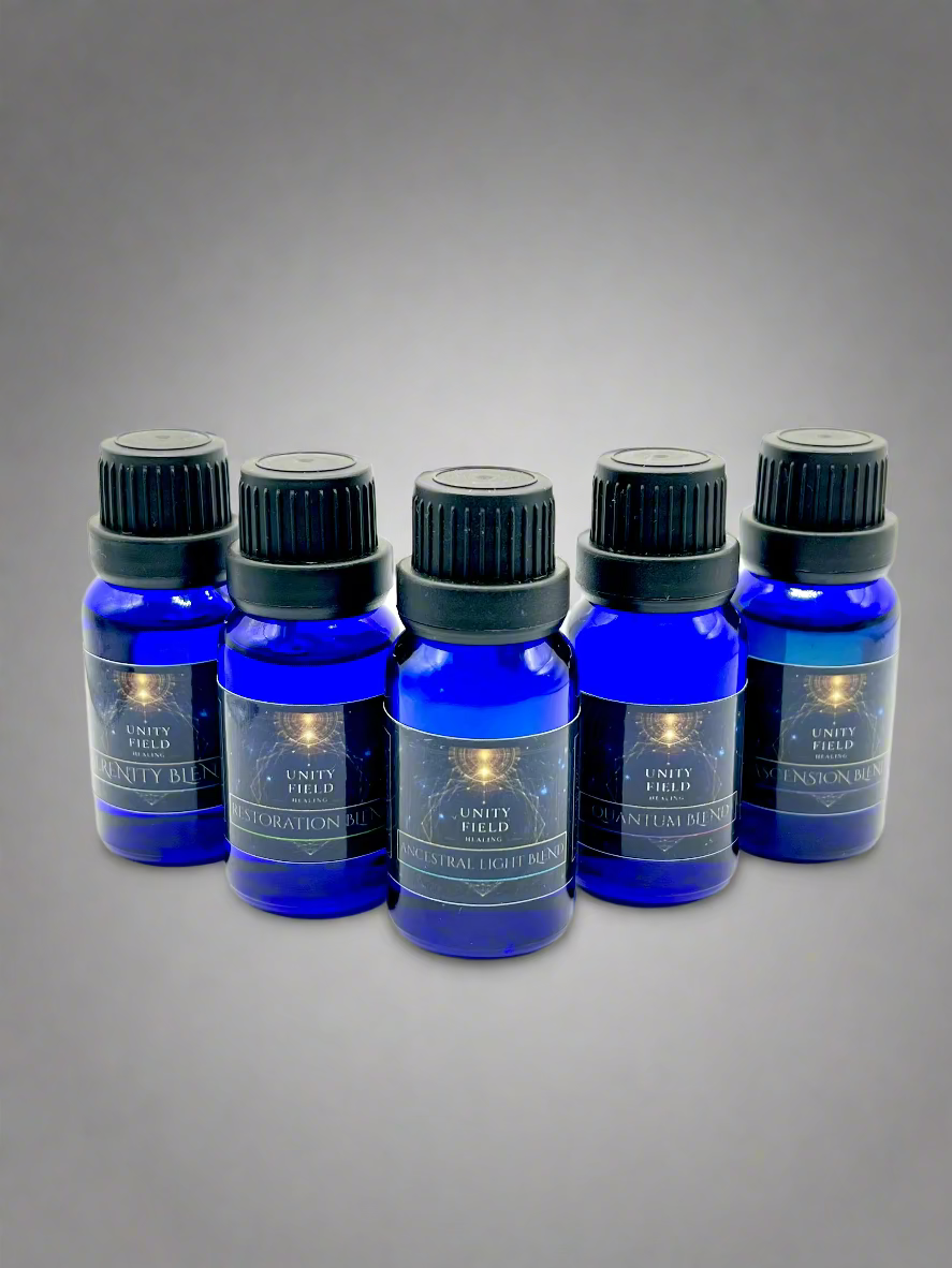 Five blue bottles with black caps on a white background