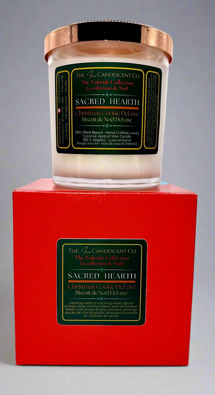 Candle with a green label on a red box against a white background
