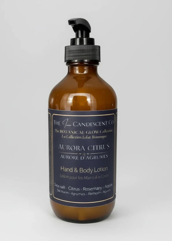 Bottle of Aurora Citrus hand and body lotion with northern lights in the background