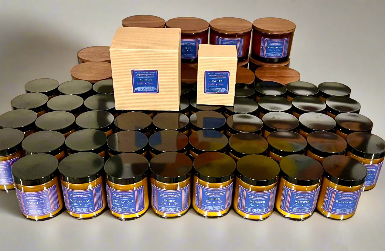 Collection of jars with blue labels and wooden boxes on a reflective surface.