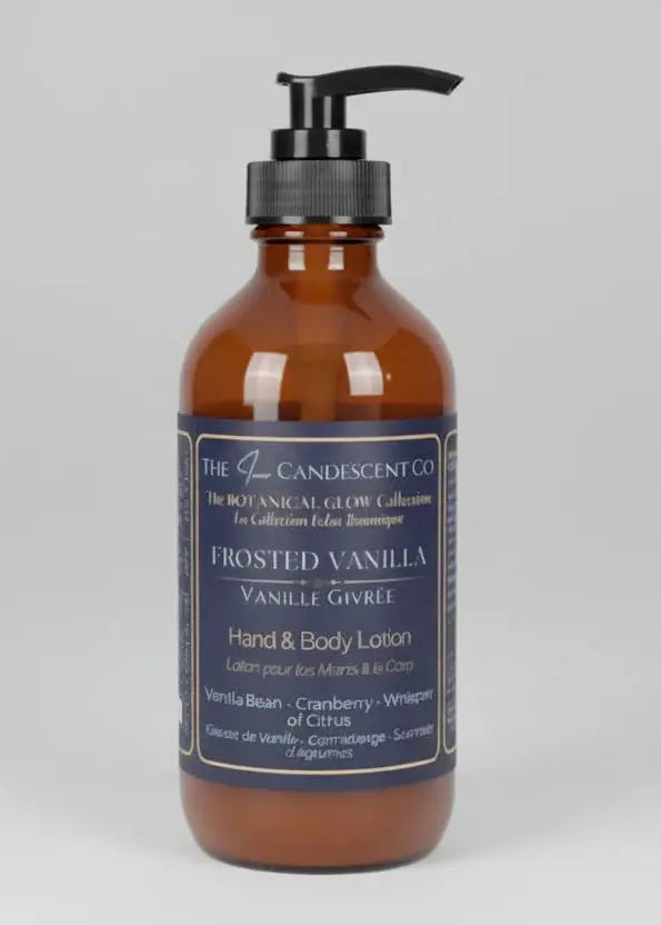 Hand and body lotion bottle with a festive background featuring berries and lights.