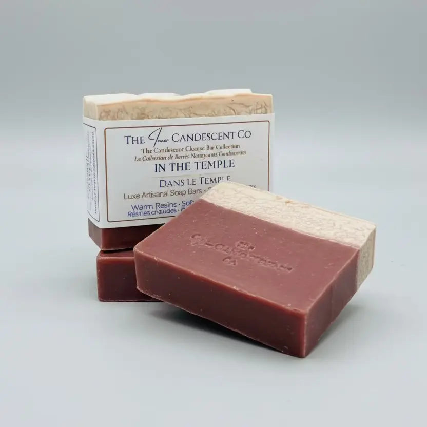 Bar of soap with packaging labeled 'The InnerCandescent Co' on a textured surface.