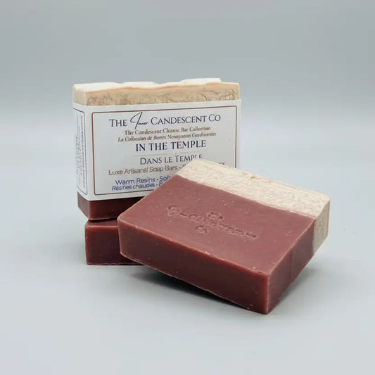 Bar of soap with packaging labeled 'The InnerCandescent Co' on a textured surface.