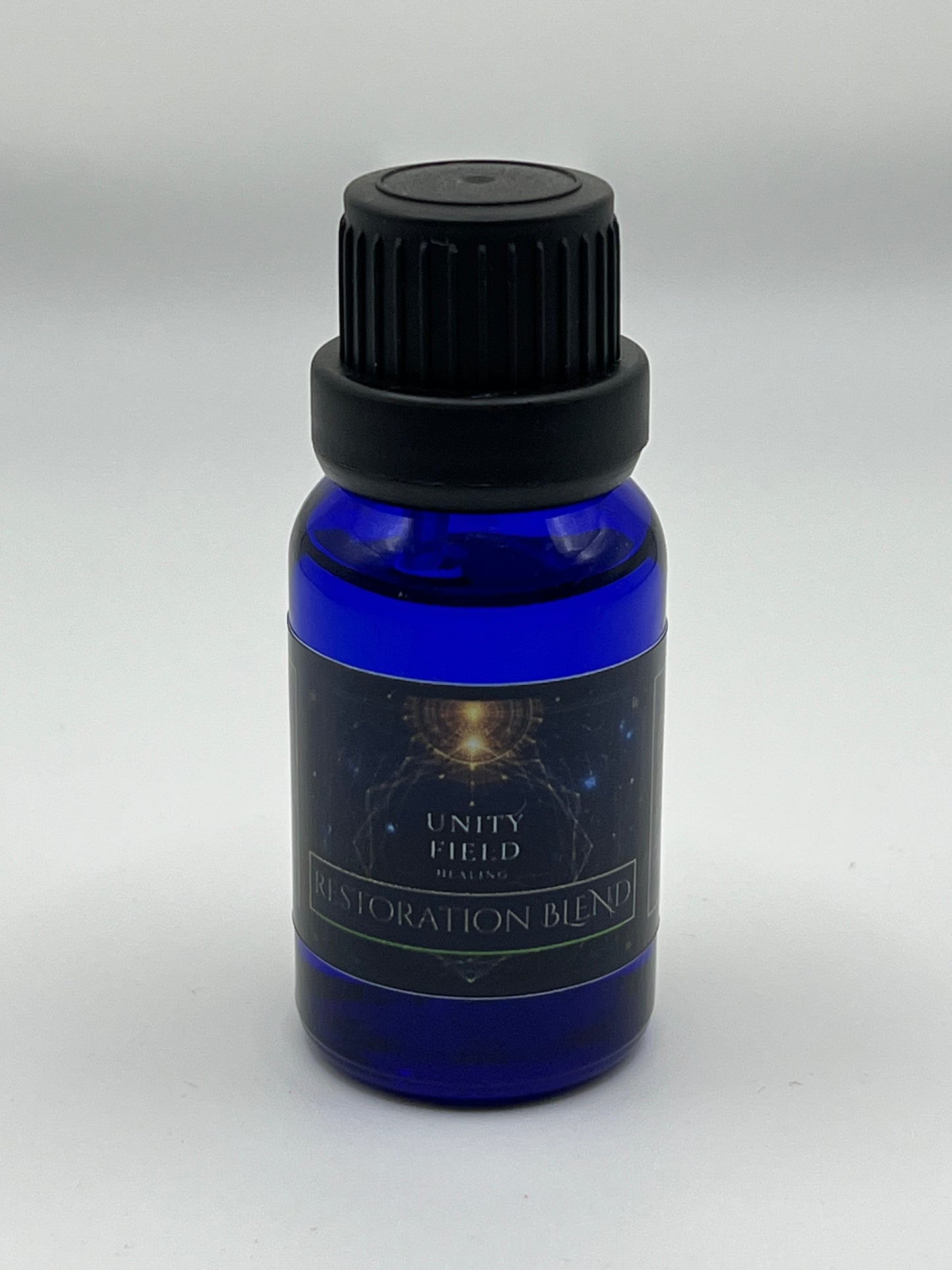 Blue bottle with black cap on a white background