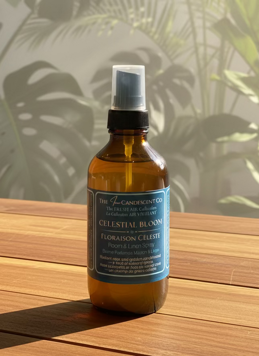 Brown spray bottle with a blue label on a white surface with a blurred outdoor background